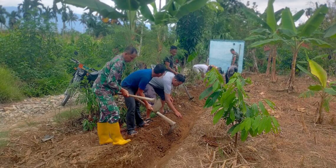 Anggota Satgas TMMD Reg Ke-125 Kodim 0108/Agara Sasaran Fisik Dan Manunggal Air Penggalian Parit