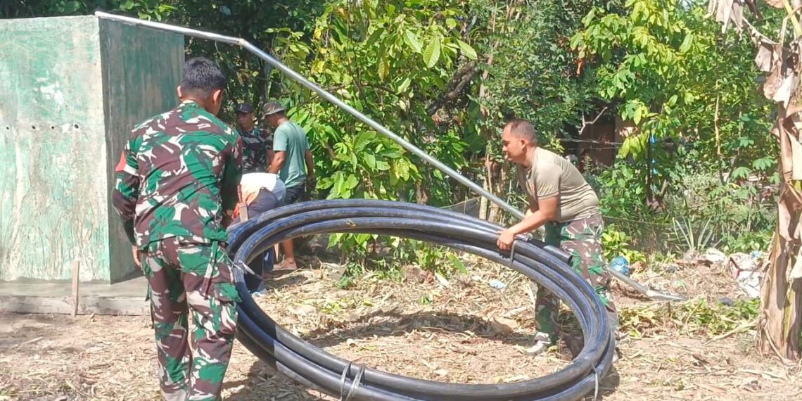 Anggota Satgas TMMD Req ke 125 Kodim 0108/Agara Terus Kebut Pemasangan Pipanisasi