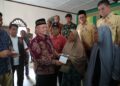 Bupati Aceh Utara Serahkan Bantuan Dana Tunggu Hunian Tahap II bagi Korban Banjir