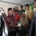 Bupati Aceh Utara Serahkan Bantuan Dana Tunggu Hunian Tahap II bagi Korban Banjir